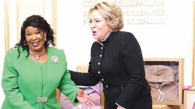 First Lady Dr Auxillia Mnangagwa shares a lighter moment with Speaker of the Russian Federation Council of the Federal Assembly Madame Valentina Matvienko about how Zimbabwean women ululate when celebrating during the handover of goods for Angel of Hope Foundation in Moscow, Russia on Monday