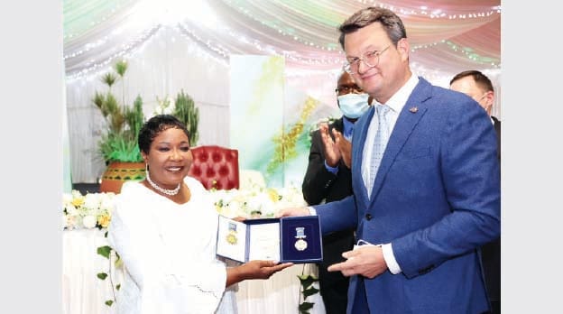 First Lady Dr Auxillia Mnangagwa receives a gold medal in recognition of her contribution to the education sector from Vernadsky Crimean Federal University of Russia, Vice Chancellor Professor, Dr Andrei Falaleev at State House yesterday. - Pictures: John Manzongo.