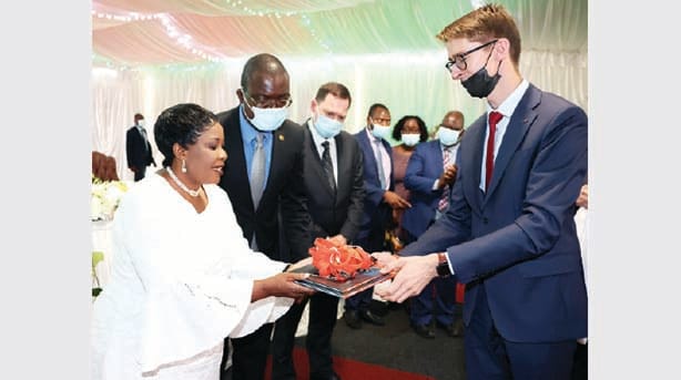 First Lady Dr Auxillia Mnangagwa receives books and other gifts for her Angel of Hope Foundation from the visiting Vice Chancellors of Russian Universities while Russian Ambassador to Zimbabwe Mr Nikolai Krasilnikov and Minister Professor Amon Murwira look on at State House yesterday.