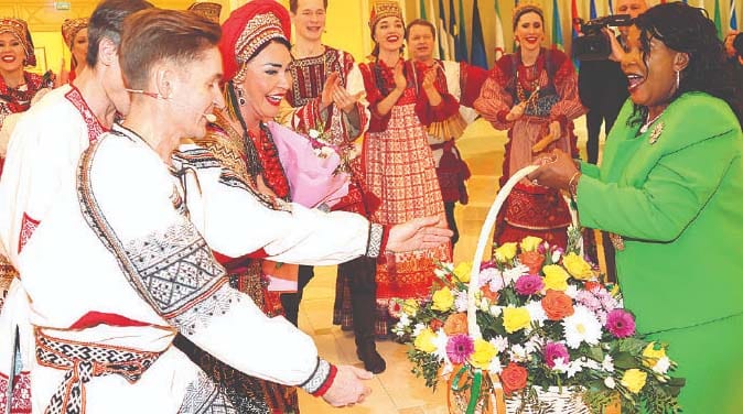 First Lady Dr Auxillia Mnangagwa hands over a bouquet of flowers to Russian traditional performers and dancers after her meeting with Speaker of the Russian Federation Council of the Federal Assembly Madame Valentina Matvienko in Moscow, Russia yesterday. – Pictures: John Manzongo