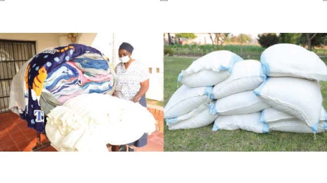 Mrs Filder Molly Chikerema with blankets and maize she donated to First Lady Auxillia Mnangagwa.