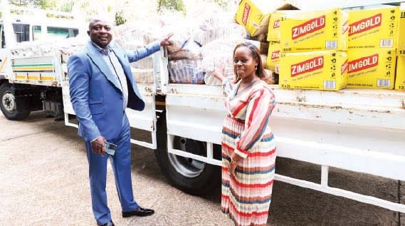 Mr Exevia Maoneke and his wife Tracy with the goods they donated to Angel of Hope Foundation at Zimbabwe House. - Picture: John Manzongo.