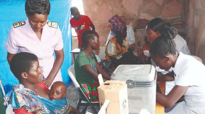 Medical personnel attend to patients during Angel of Hope Foundation free medical outreach organised by Health and Child Care Ambassador First Lady Dr Auxillia Mnangagwa in Kanyemba recently