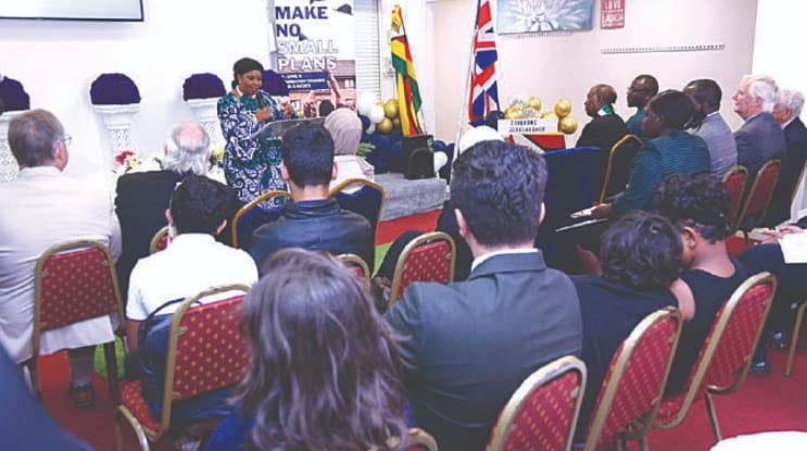 First Lady Dr Auxillia Mnangagwa gives an acceptance speech after her Angel of Hope Foundation secured UK scholarships for girls awarded by Cornerstone College Cambridge