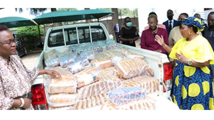 Angel of Hope Foundation patron First Lady Dr Auxillia Mnangagwa receives a donation from Competition and Tarrifs Commission officials at Zimbabwe House on Wednesday. Picture: John Manzongo