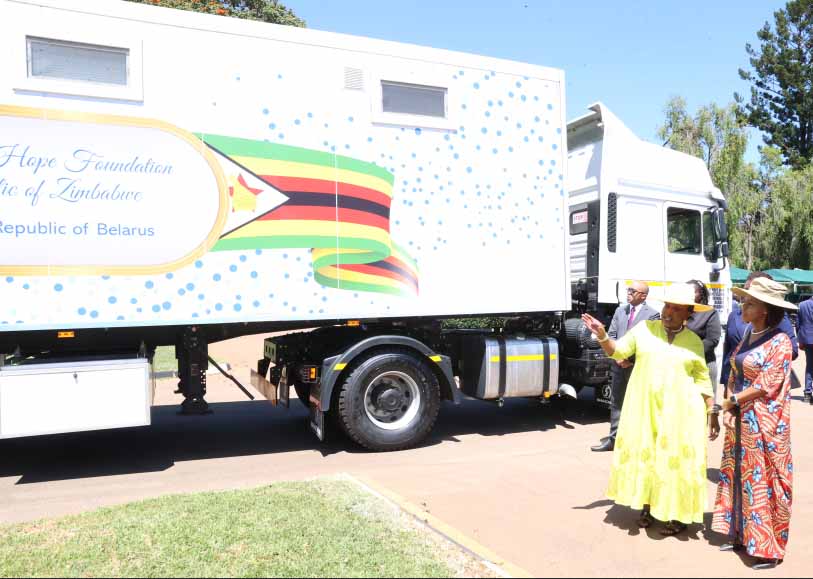 First Lady Dr Auxillia Mnangagwa shows Batswana First Lady Mrs Neo Jane Masisi her mobile hospital at State House in Harare on Wednesday