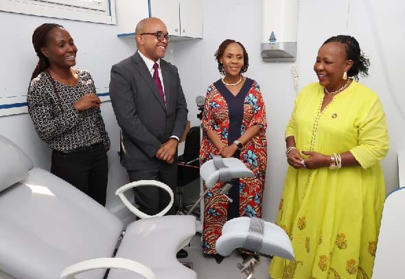 Batswana First Lady Mrs Neo Jane Masisi and First Lady Dr Auxillia Mnangagwa share a lighter moment with doctors in the gynaecology unit of her mobile hospital at State House in Harare on Wednesday. – Pictures: John Manzongo