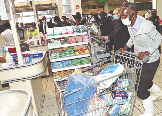 Representatives of old people’s homes, people with Albinism and children’s homes rush to beat the clock during a trolley dash promotion organised by NetOne on Friday