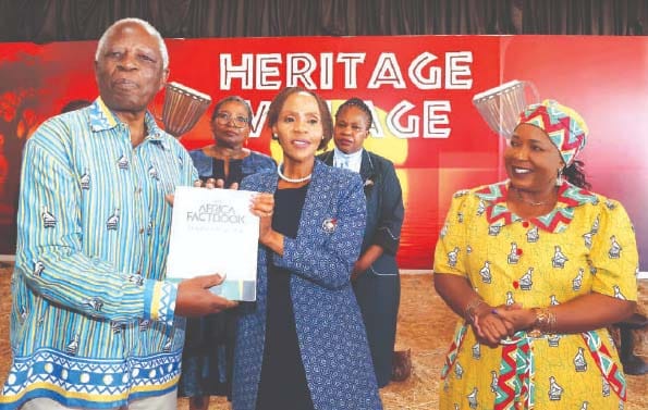 Instak chairman Professor Simbi Mubako hands over the Africa Fact Book to Botswana First Lady Mrs Neo Jane Masisi while First Lady Dr Auxillia Mnangagwa looks on after a tour of the Museum of African Liberation in Harare on Thursday