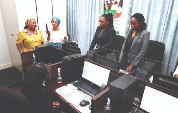 First Lady Dr Auxillia Mnangagwa takes Botswana First Lady Mrs Neo Jane Masisi on a tour of the National Gender-Based 575 call centre at Zimbabwe House on Thursday. Pictures: John Manzongo