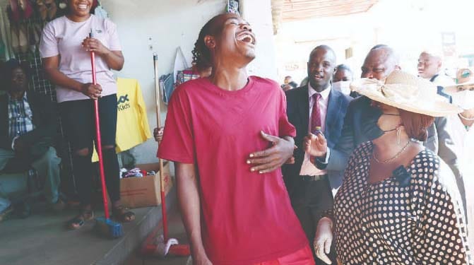 First Lady Dr Auxillia Mnangagwa shares a lighter moment with a young man she saw drinking alcohol during a clean-up campaign in Harare’s Central Business District yesterday