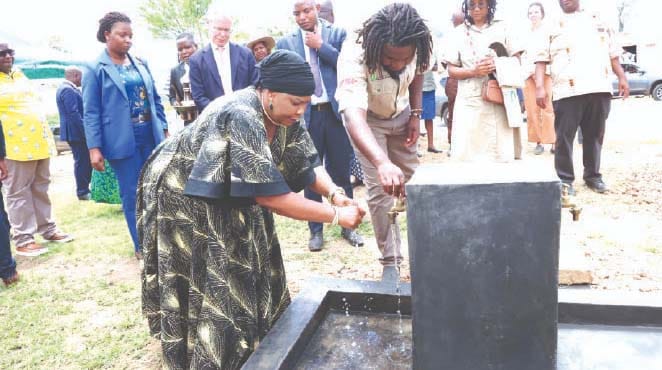 First Lady Dr Auxillia Mnangagwa officially commissions the 7,2km piped water scheme in Muzarabani yesterday