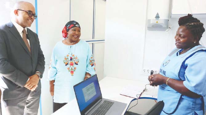 Angel of Hope Foundation patron First Lady Dr Auxillia Mnangagwa and Dr George Jakanani listen as Sr Linda Karera explains how they book patients for cancer screening into the ultra-modern top-notch mobile hospital at Parirenyatwa Group of Hospitals yesterday