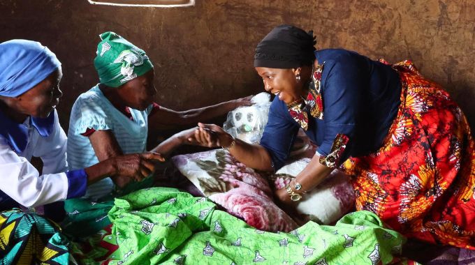 First Lady Dr Auxillia Mnangagwa hands over blankets, food hampers, toiletries and other goods to Gogo Ellah Guta who also remembered Amai Mnangagwa’s face from previous interactions with elderly at her homestead in Mutasa, Manicaland yesterday