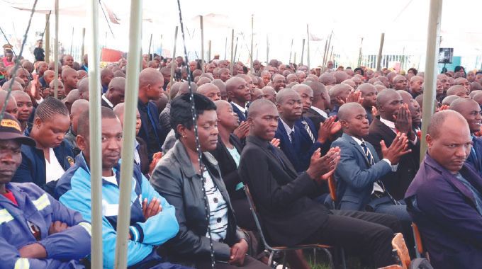 Part of the crowd and beneficiaries of the Angel of Hope Foundation and ZOU partnership in short courses during the graduation ceremony at the ZRP Staff College yesterday