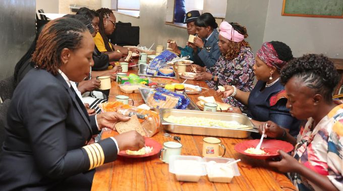 First Lady Dr Auxillia Mnangagwa enjoys tea with women who have excelled in their various careers before they shared their experiences with girls attending the week-long boot camp she organised for girls from all the country’s ten provinces yesterday