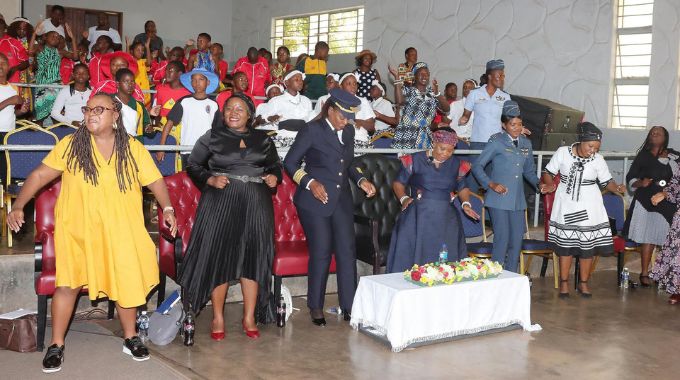 First Lady Dr Auxillia Mnangagwa, Air Zimbabwe pilot Captain Chipo Matimba, ZBC head of Television Merit Munzwembiri, Herald Editor Victoria Ruzvidzo, Air Force of Zimbabwe fighter jet pilot Wing Commander Angeline Bosha, musician Bethany Pasinawako-Ngolomi and radio and TV presenter Tilda Moyo dance during the First Lady’s career guidance workshop to girls attending a weeklong boot camp yesterday