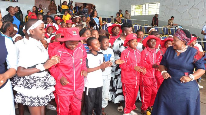 First Lady Dr Auxillia Mnangagwa joins girls from all the country’s provinces attending a week-long boot camp in song and dance during an interactive and educative First Lady’s career guidance workshop yesterday