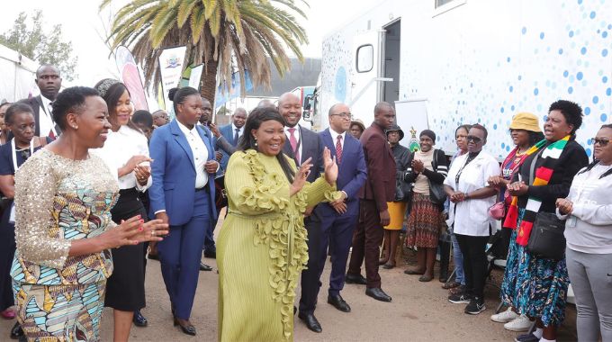 First Lady Dr Auxillia Mnangagwa and her Kenyan counterpart Mrs Rachel Ruto and Mrs Miniyothabo Chiwenga greet women queuing for breast and cervical cancer screening at an Angel of Hope Foundation mobile hospital at the ZITF exhibitions grounds in Bulawayo on Saturday. – Pictures: John Manzongo