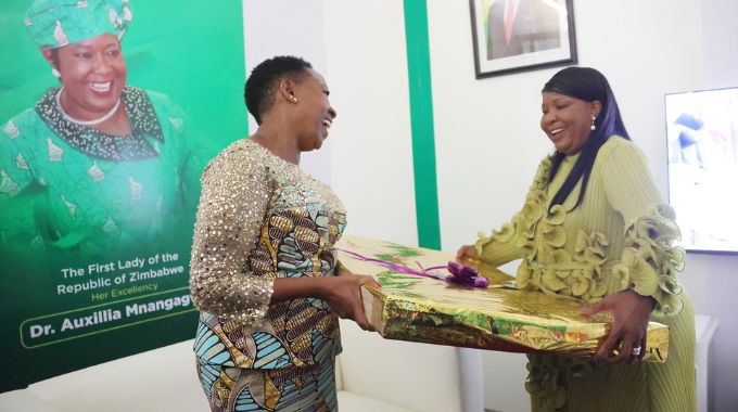 First Lady Dr Auxillia Mnangagwa hands over gifts to her Kenyan counterpart Mrs Rachel Ruto after their tour of exhibitions stands at the Zimbabwe International Trade Fair on Saturday