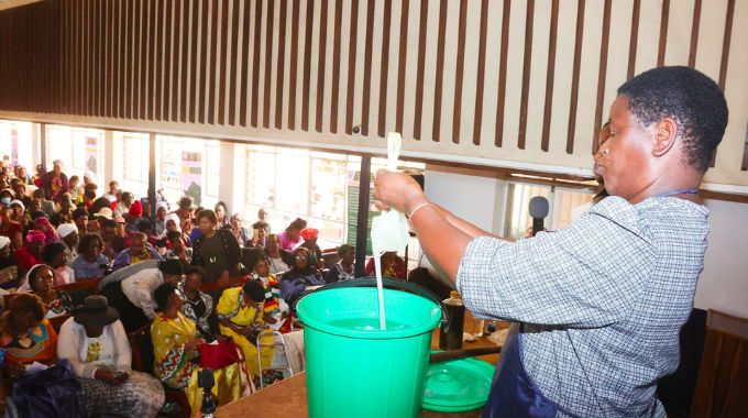 Female war veterans, spouses and widows of the liberation struggle being taught how to make detergents as one of the life changing projects which were brought to them by First Lady Dr Auxillia Mnangagwa in Harare yesterday