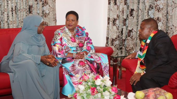 First Lady Dr Auxillia Mnangagwa interacts with Minister of State FCT Dr Mariya Mahmoud and Zimbabwean Ambassador to Nigeria Mr Maxwell Ranga soon after her arrival in Abuja, Nigeria