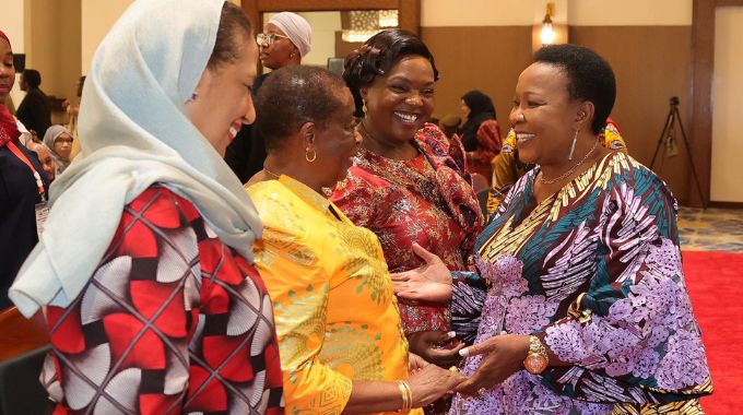 First Lady Dr Auxillia Mnangagwa interacts with former Tanzanian First Lady Mrs Anna Mkapa while Kenyan Vice President’s wife Pastor Dr Dorcas Rigathi looks on during the African Widows Summit in Zanzibar yesterday