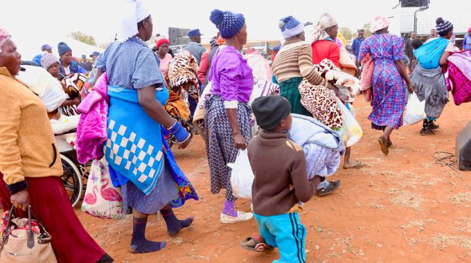 First Lady Dr Auxillia Mnangagwa distributes blankets and food hampers to those living with disabilities, elderly and other vulnerable groups in Chingwizi