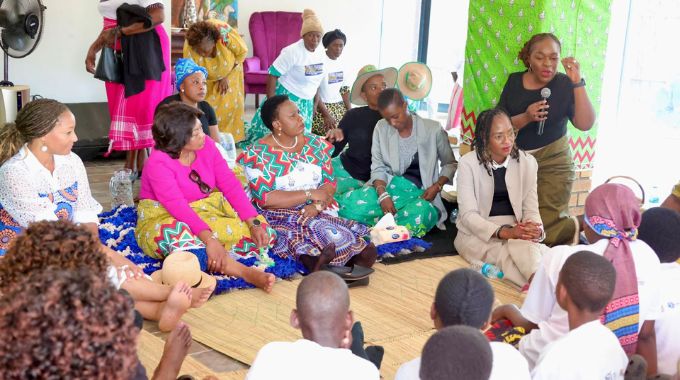 Malawi Minister of Tourism Hon Vera Kamtukule teaches girls while First Lady Dr Auxillia Mnangagwa, Angolan First Lady Mrs Anna Dias Laurenco and representatives of Rwandan, Equatorial Guinea and Namibian look on during a nhanga programme in Victoria Falls