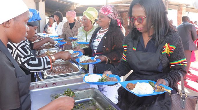 Wives of Ministers and permanent secretaries who accompanied First Lady Dr Auxillia Mnangagwa to Chikurubi female prison served food to the inmates and their babies