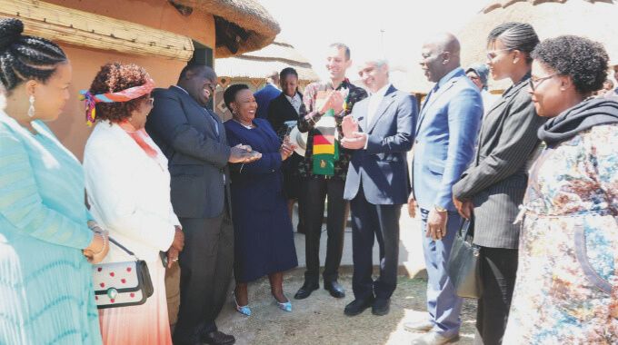 First Lady Dr Auxillia Mnangagwa interacts with Ambassadors accredited to Zimbabwe, Mr Alexander Grant Ntrakwa of Ghana, Mr Abbas Navazani of Iran, Mr Tamer Almassri of Palestine, Mr Derick Livune of Zambia, Eswatini Princess Lindiwe, Ms Grace Neo Likando from Zambia, Ministers Sithembiso Nyoni and Aplonia Munzverengwi during a maiden nhanga/gota/ixhiba programme she organised at the Heritage Village in Harare on Sunday. - Pictures: John Manzongo