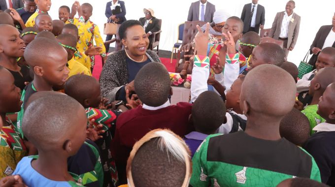 First Lady Dr Auxillia Mnangagwa joins boys on the dance floor during her inaugural national boys camp in Mashonaland West yesterday. – Pictures: John Manzongo