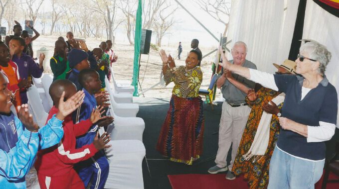 White farmers teach boys while First Lady Dr Auxillia Mnangagwa looks on during the First Lady’s national boys camp