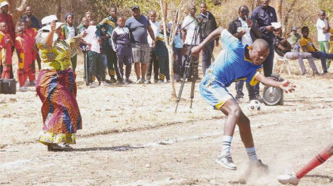 First Lady Dr Auxillia Mnangagwa cheers boys as they play soccer during her inaugural national boys camp