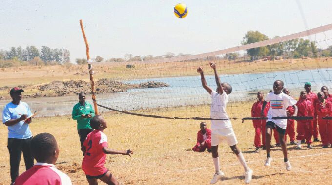 Boys play volleyball during the First Lady’s national boys camp