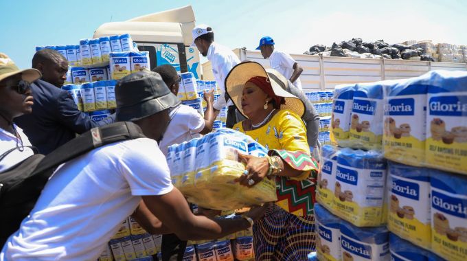 First Lady Dr Auxillia Mnangagwa distributes goods for widows to start income generating projects during the launch of First Lady’s Widows Association in Bulawayo on Saturday. – Pictures: Edward Zvemisha