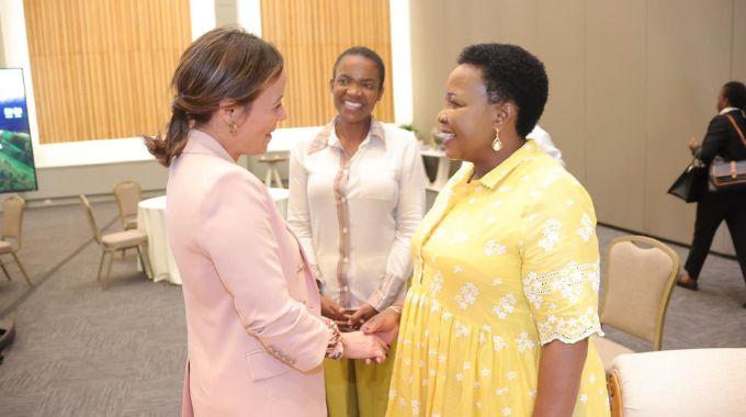 Tourism patron First Lady Dr Auxillia Mnangagwa chats with Dominican Republic Vice Minister of Tourism Mrs Patricia Mejia after she paid a courtesy call on her. Looking on is Tourism and Hospitality Industry Minister Barbara Rwodzi.