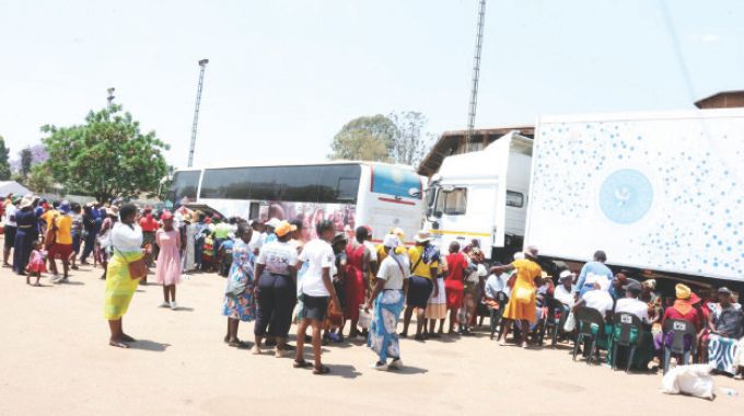 First Lady leads breast cancer awareness drive, providing free breast and cervical cancer screening services for hundreds of women in Harare.