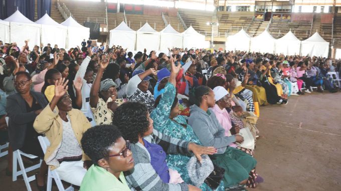 Women working in various Government departments and others follow proceedings during their interactive session with First Lady Dr Auxillia Mnangagwa in Harare