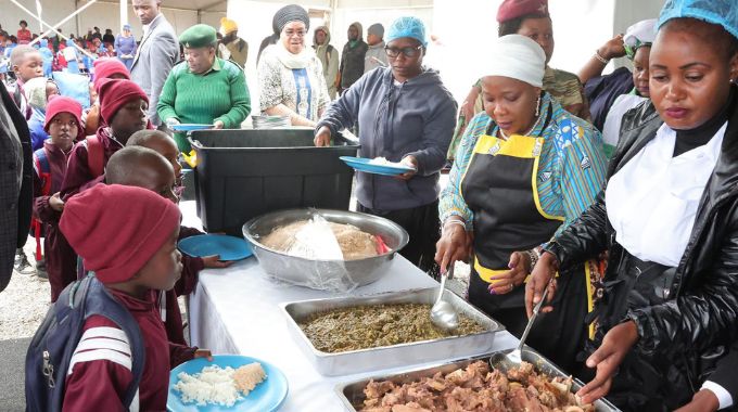 First Lady takes school feeding programme to Midlands and also donated 30 tonnes of maize meal to schools in the area.