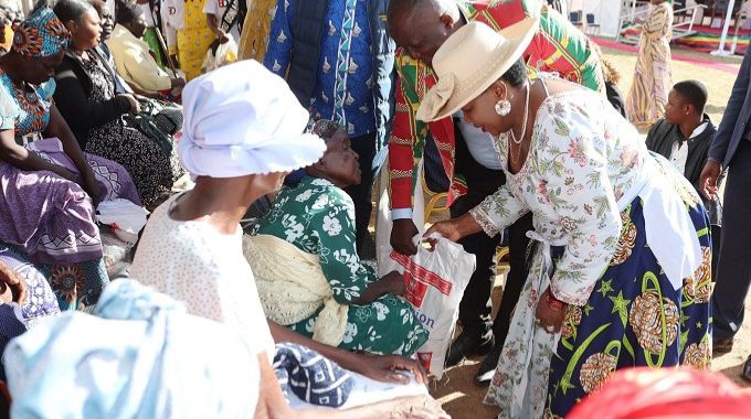 First Lady Dr Auxillia Mnangagwa hands over early Christmas gifts in the form of food hampers and toiletries to the elderly and traditional chiefs in Masvingo