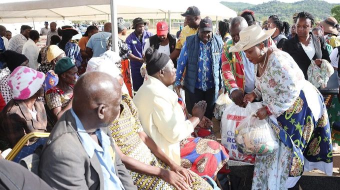 First Lady Dr Auxillia Mnangagwa hands over early Christmas gifts to the elderly and traditional chiefs in Masvingo. — Pictures: John Manzongo