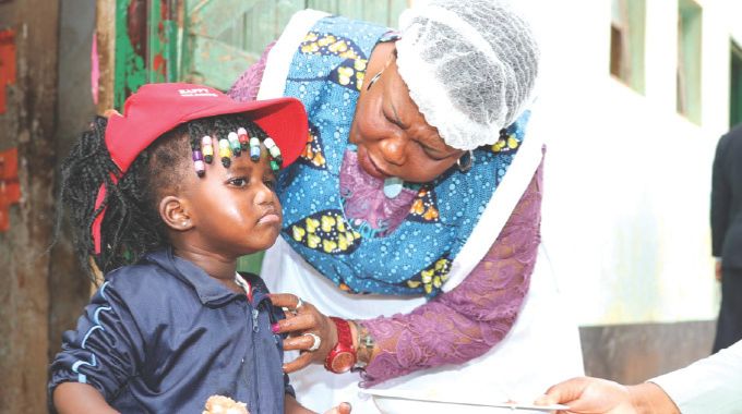 First Lady takes school feeding programme to Zaka in a move meant to complement Government efforts to keep children in school.