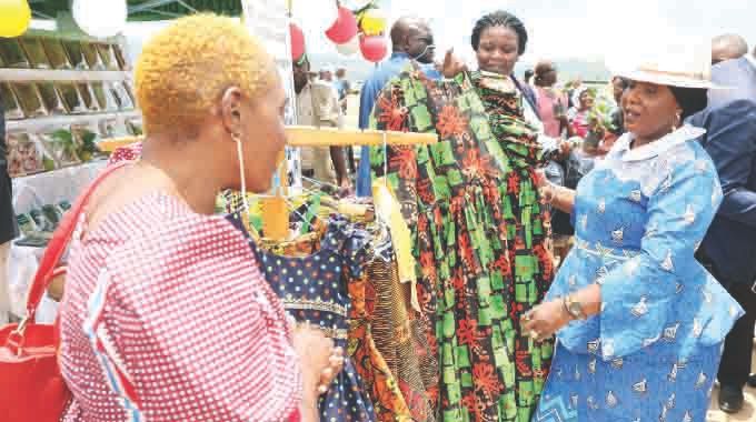 First Lady Dr Auxillia Mnangagwa bought a dress sewn by Ms Kasiyamhuru for double the price so as to promote her business in Honde Valley, Manicaland on Monday