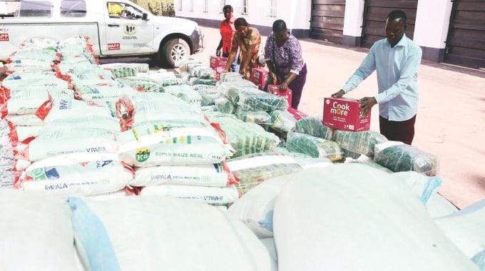 Representatives of children’s homes in Mashonaland East, Mashonaland Central, Mashonaland West and Harare collect their donations from Angel of Hope Foundation at Zimbabwe House. —Pictures: John Manzongo