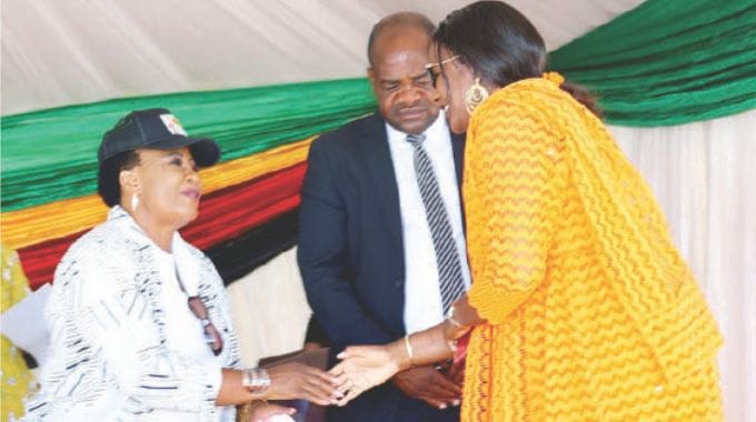 First Lady Dr Auxillia Mnangagwa greets UN women country representative Ms Fatou Aminata Lo during a campaign against Gender Based Violence in Epworth yesterday.