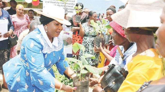 AGRIC4SHE patron First Lady Dr Auxillia Mnangagwa distributes banana seedlings to women during the launch of Banana4SHE, in Honde Valley, Manicaland an initiative to economically empower women in rural and marginalised communities