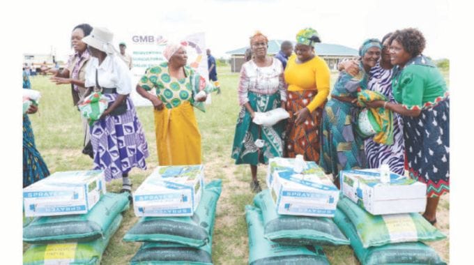 Beneficiaries celebrate after  Agric4SHE patron, First Lady Dr Auxillia Mnangagwa handed over agriculture inputs that include maize seed, vegetable combo seed, fertilisers, knapsack and pesticides to the elderly and vulnerable groups in Mashonaland Central.