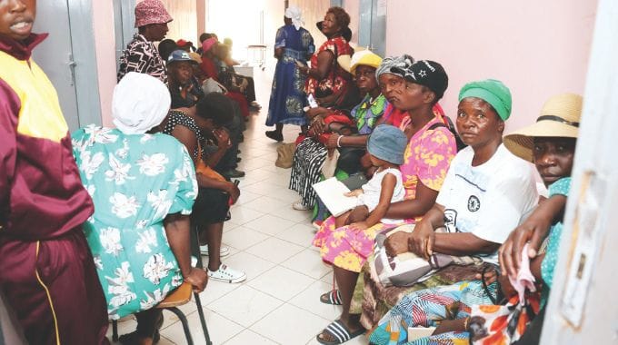 Women and children queue for free medical checks during a medical outreach brought by Health Ambassador First Lady Dr Auxillia Mnangagwa in Gokwe yesterday