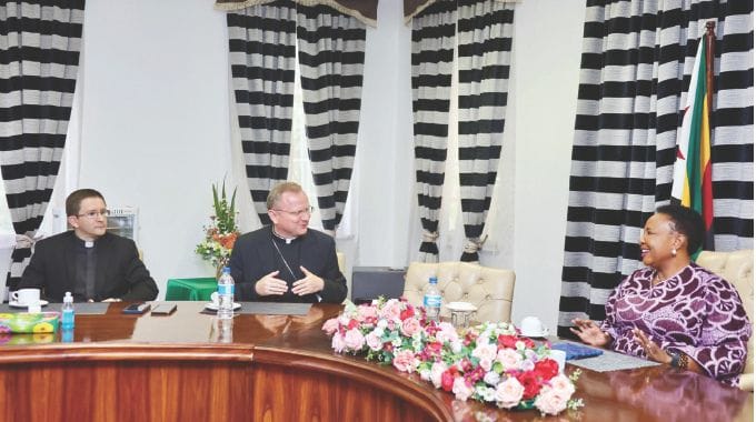 First Lady Dr Auxillia Mnangagwa interacts with Vatican Ambassador Archbishop Janusz Urbanczyk, the Apostolic Nuncio to Zimbabwe during a courtesy call at Zimbabwe House on Tuesday